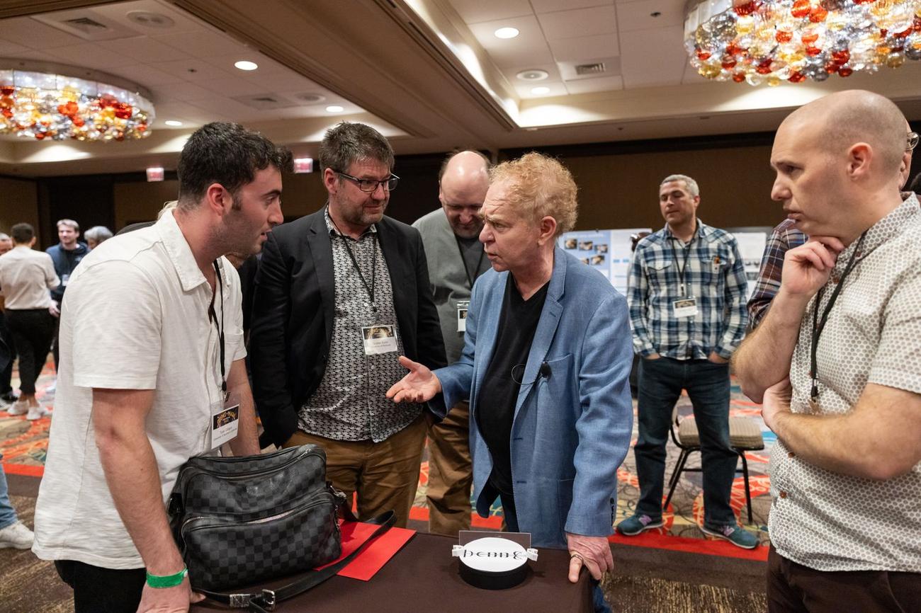 Tyler Gibgot in conversation with Teller and cognitive scientist Gustav Kuhn at the Science of Magic Association conference.
